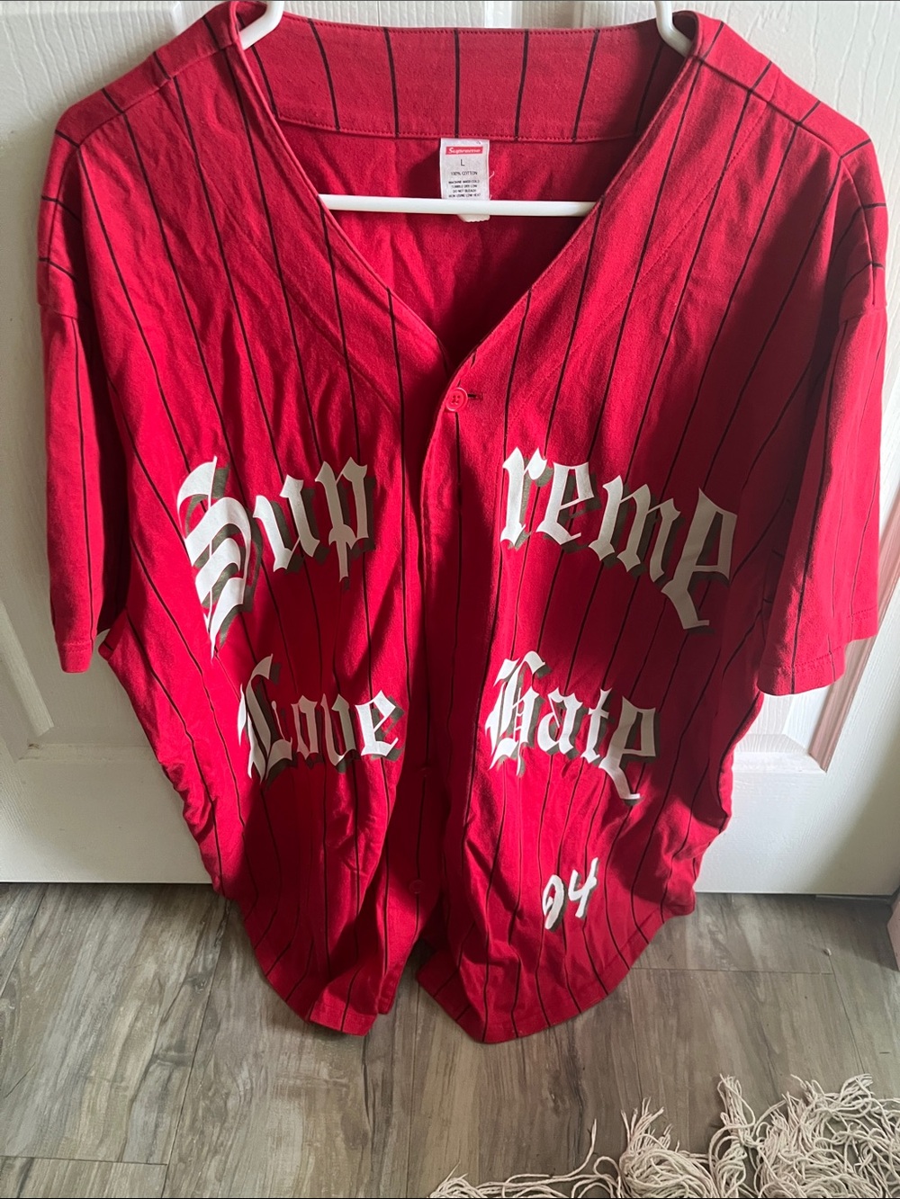 Supreme Red Pinstripe Baseball Jersey with White Gothic Logo